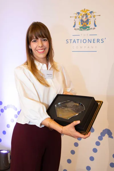 Nataly Rios accepts award The Stationers Award ceremony