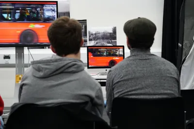 Students watch movie image pieces during photography masterclass