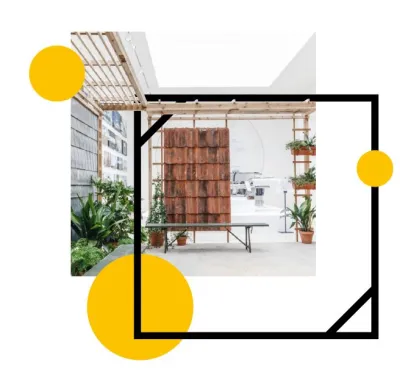 a photograph of a new building covered in wood and glass