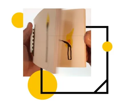 a photo of a cartridge flipbook being opened by hands in the background