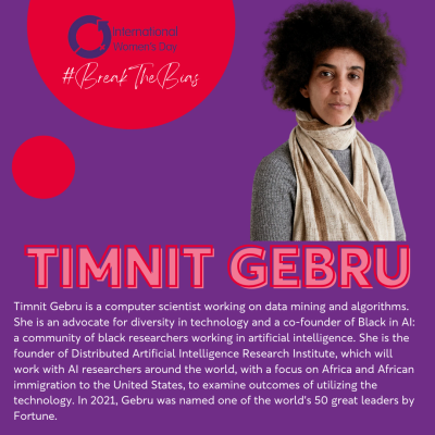 Portait of Timnit Gebru a mixed race woman with a beautiful afro wearing a cream scarf