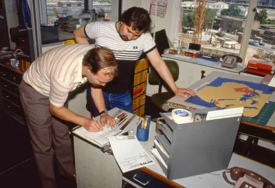 Filling out a news graphic requisition (1985)