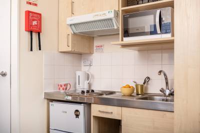 Bronze Studio kitchen with appliances
