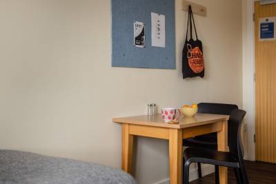 Bronze Studio room with table and chairs