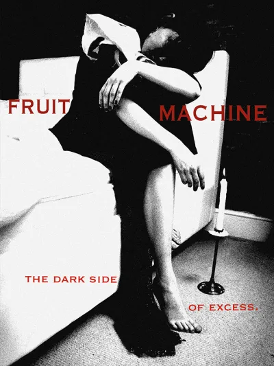 Black and white image of a woman resting on a bed