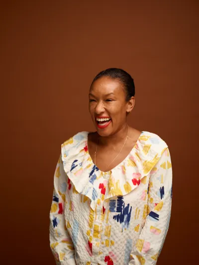 Natalie laughing and similing