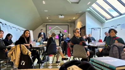 A photo of students at a workshop