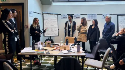 A photo of industry experts at a workshop