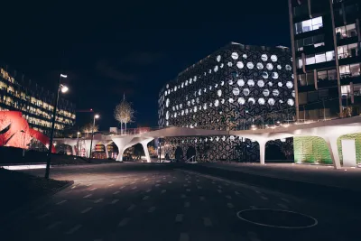 Nighttime view of The Tide bridge in Greenwich Peninsula area 