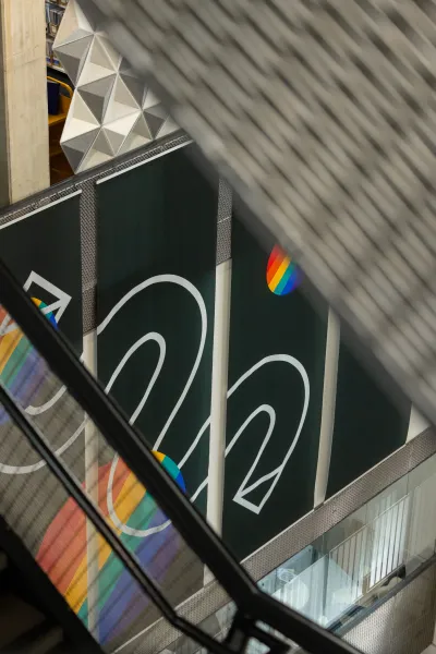 Aerial view of Ravensbourne University poster with pride colours