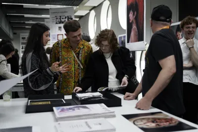 parents viewing student work at showcase