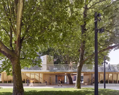 Photo of a park with two large trees
