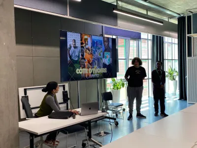 A person presenting their work
