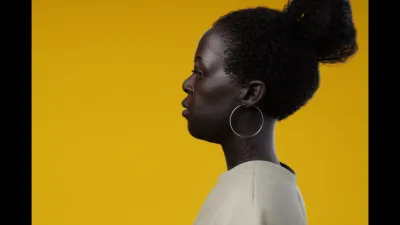 3D animation titled Ayo by Iulian Dumitrache showing a woman's profile against a yellow background